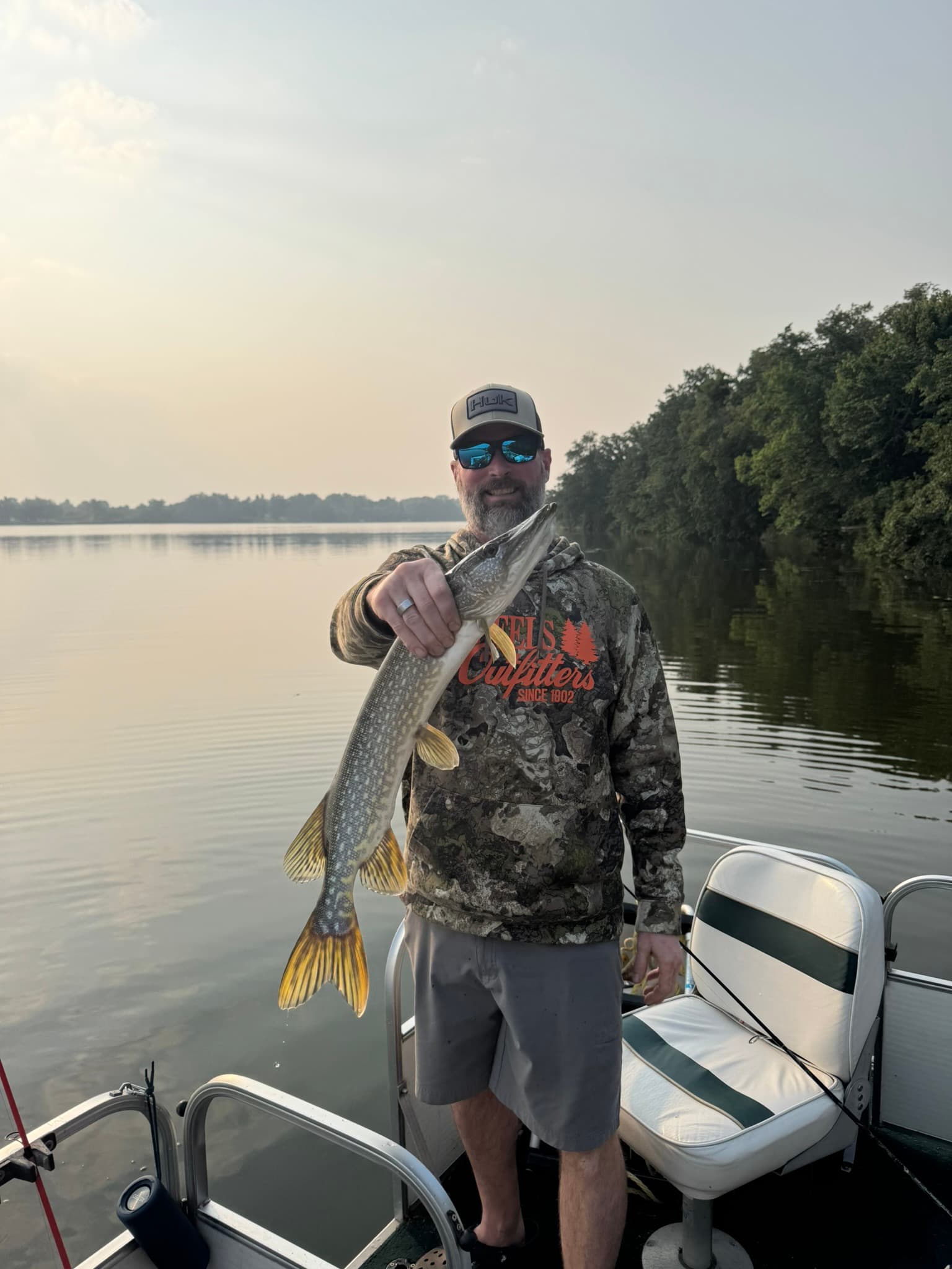 Corey holding a northern pike